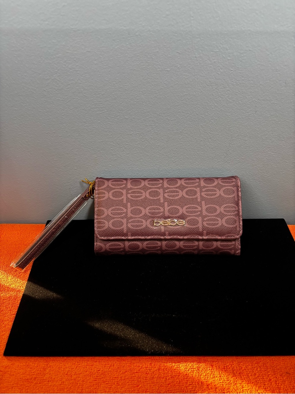 bebe Logo Trifold Wristlet Wallet in Plum